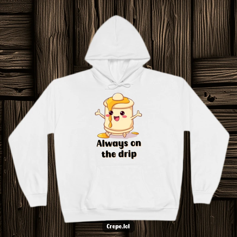 Funny pancake hoodie featuring a bouncing character with playfully dripping syrup, a warm and humorous apparel item.