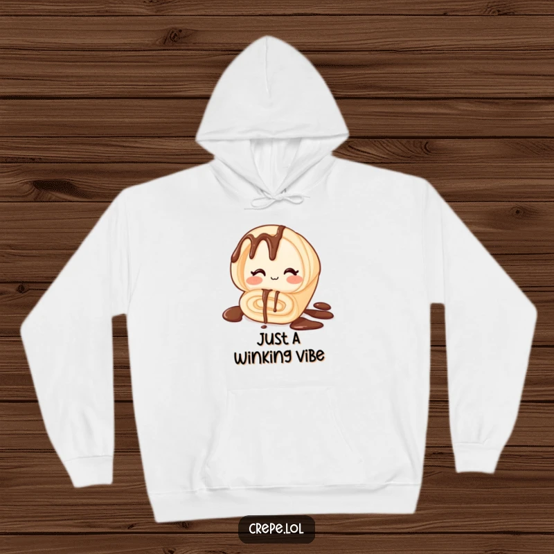 Funny hoodie depicting a rolled chocolate crepe with a playful wink, offering warmth and humor for casual wear, great gift.