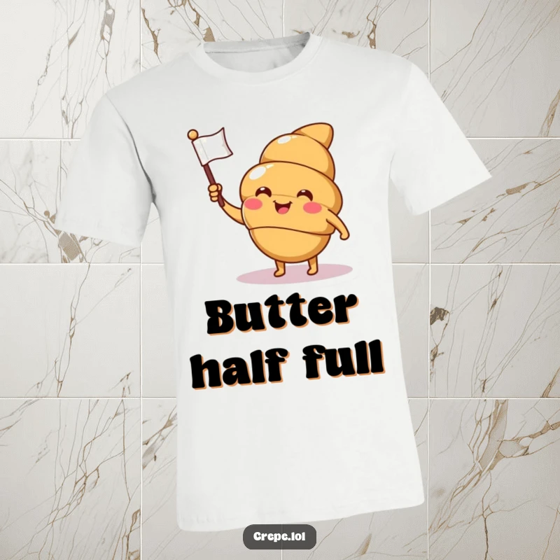 Funny croissant t-shirt with a smiling character waving a tiny flag and winking, ideal for casual, chic, and humorous wear.