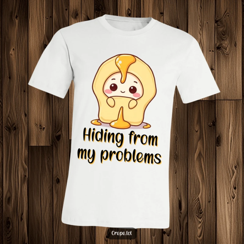 Funny t-shirt depicting a shy banana crepe cautiously peeking from behind a sweet, sticky drizzle of syrup.